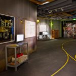 Photograph of part of the Collider exhibition showing a mock section of the interior of CERN