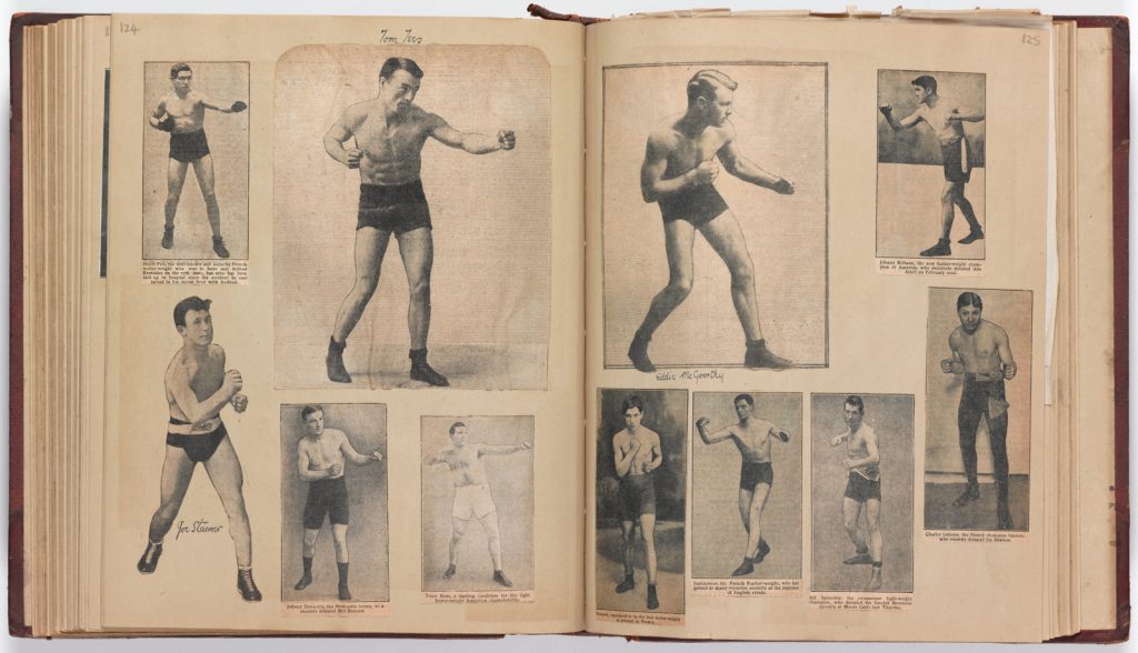 Page from a scrap book showing paper cuttings of a number of early 20th century male boxers in various poses