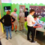 Colour photograph of museum goers at an exhibition about colour
