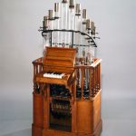 Colour photograph of a pyrophone musical instrument