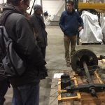 Colour photograph of people visiting the museum collections warehouse
