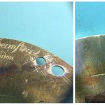 The pillar plate of the movement showing now-redundant holes where the dial and case fixings were attached, and the signature on the movement and the star punch-mark on the underside of the potence plate