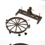 Colour photograph of a wooden wheel of fortune