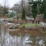 Colour photograph of a number of concrete extinct species models from the nineteenth century