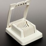 Colour photograph of an egg slicer modified to make sound