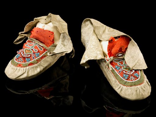 Colour photograph of a pair of aboriginal north american moccasins