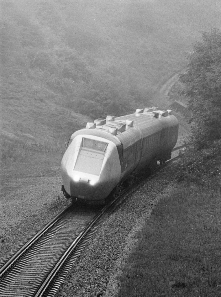 Black and white photograph of an advanced passenger train on tracks in the 1960s