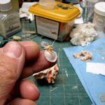 colour photograph of 3d printed ossicle bones attached to a silicon tympanic membrane