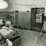 Black and white photograph of Janet Shipton with a six channel EEG in 1955