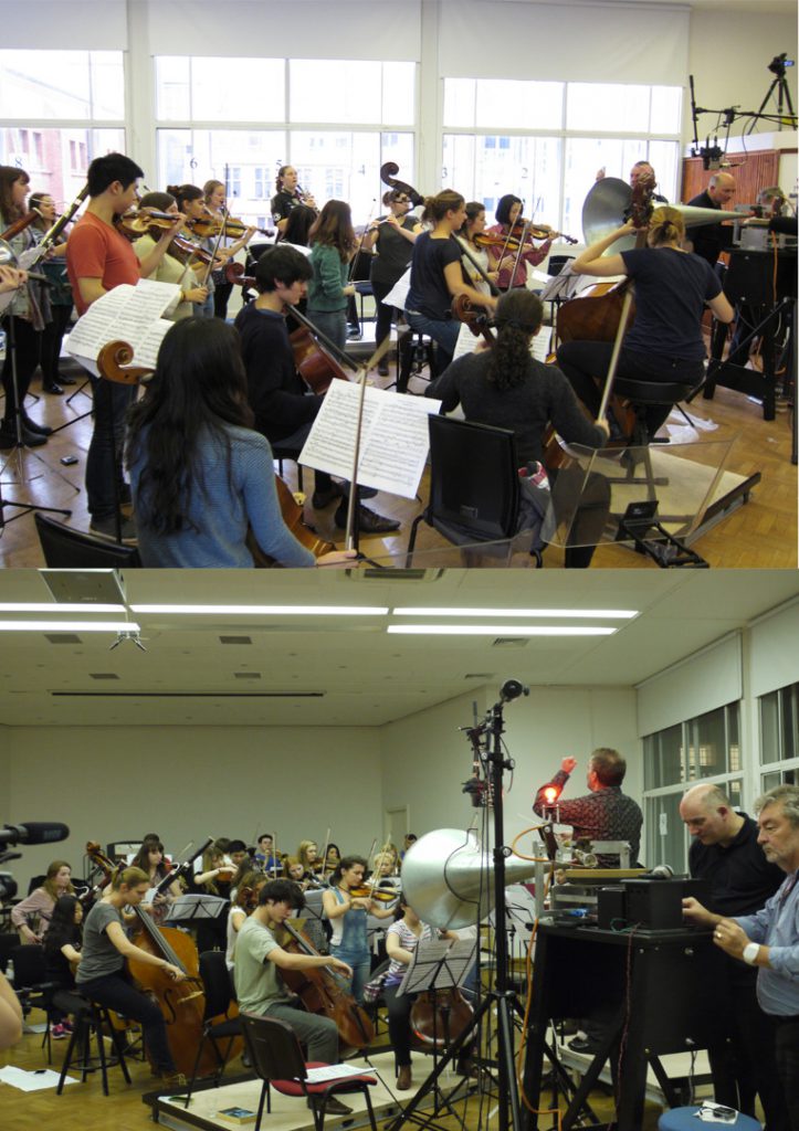 Colour photographs of the RCM orchestra recording onto wax disc