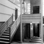 Black and white photograph showing a silent elevator installed at the Science Museum as part of the noise abatement exhibition