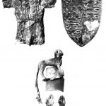 Black and white photographs of a jupon with the arms of Edward Prince of Wales a shield with the arms of King Edward third and the Black Princes helm crest and gauntlets