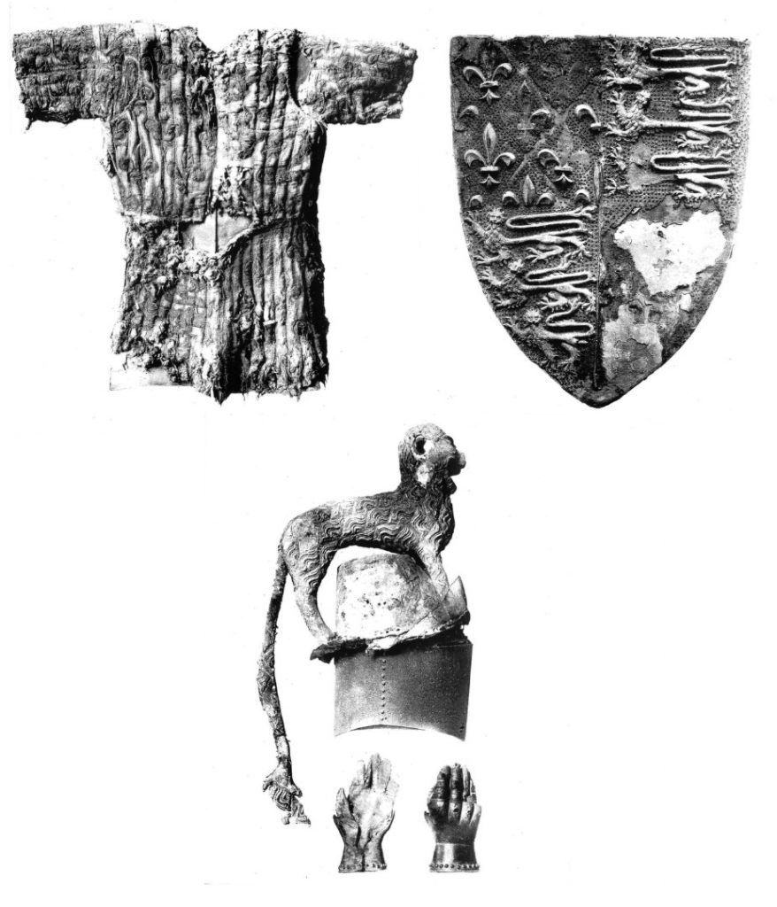 Black and white photographs of a jupon with the arms of Edward Prince of Wales a shield with the arms of King Edward third and the Black Princes helm crest and gauntlets