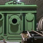 Colour photograph of a gas station meter constructed in the style of a small town hall building