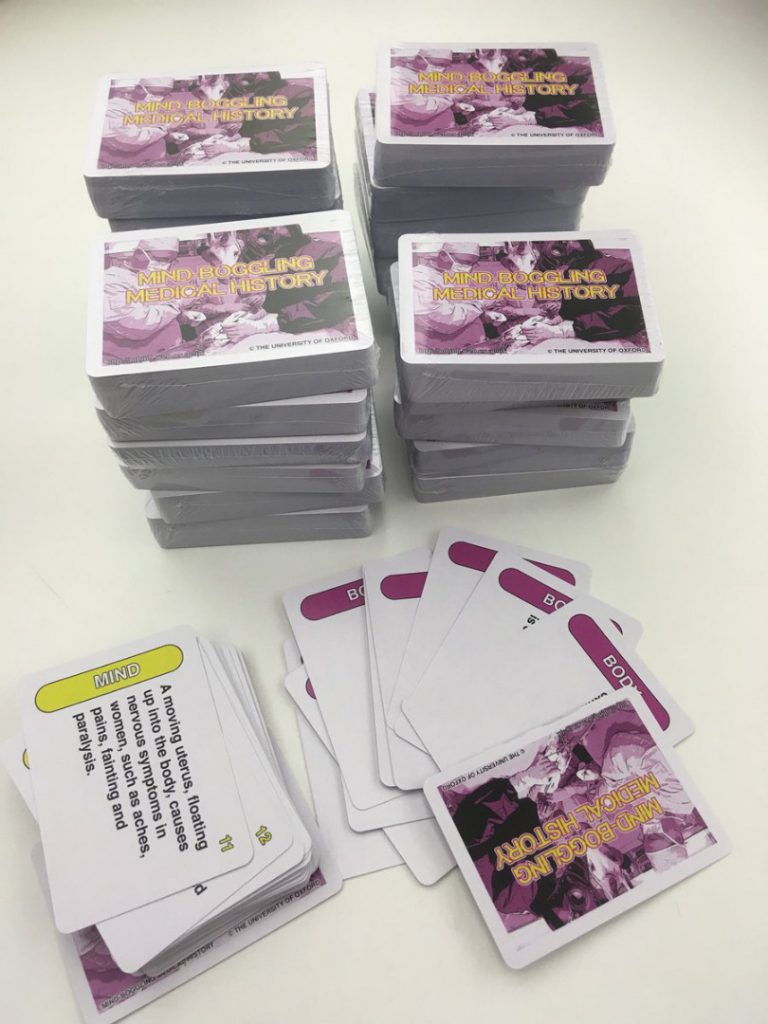 Colour photograph of card packs for the Mind Boggling Medical History game
