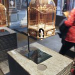 Colour photograph of a cuckoo clock installed as a listenable object in the Fondazione Prada museum in Venice