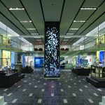 Colour photograph of a view of the Chemical Heritage Foundation including a video column showing the periodic table