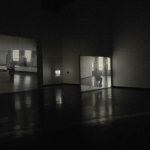 Colour photograph of a video installation within a gallery