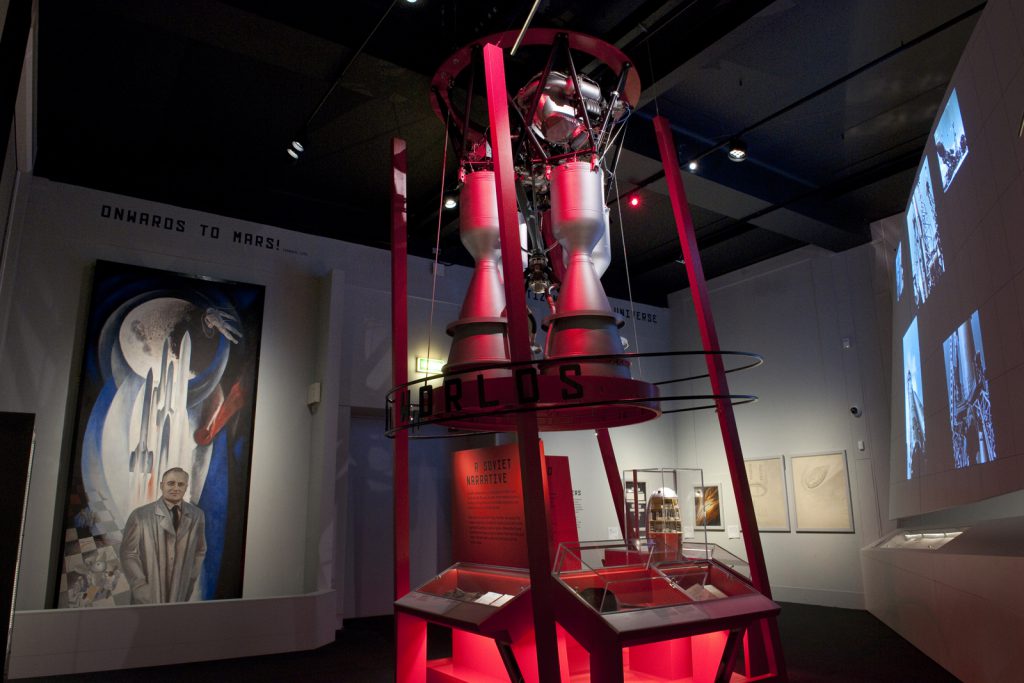 Colour photograph of a section of the Cosmonauts exhibition showing a section of a rocket