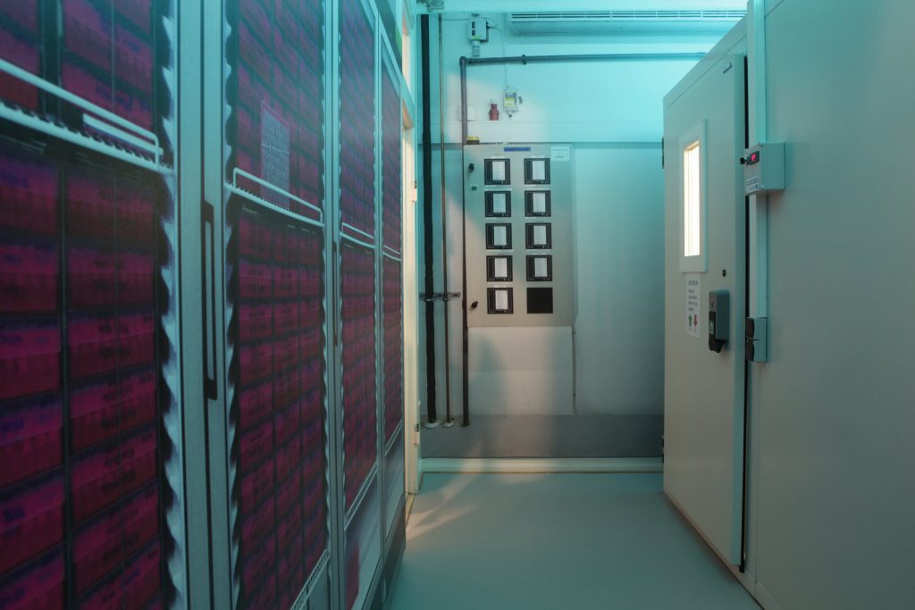 Colour photograph of the corridor of a medical refrigeration facility