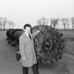 Black and white photograph of Robert Bud alongside a Haber-Bosch reaction vessel