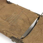 Colour photograph of a stretcher on display in the Wounded exhibition