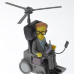 Colour photograph of a Simpsons style Stephen Hawking miniature model