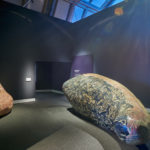 Colour photograph of cetacean scagliola sculptures in the Natural History Museum