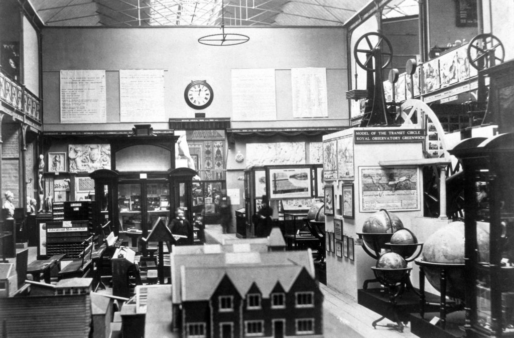 Black and white photograph of the Education Collection at the South Kensington Museum including the Transit Circle