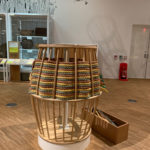 Colour photograph of a basket making themed interactive display in an exhibition gallery