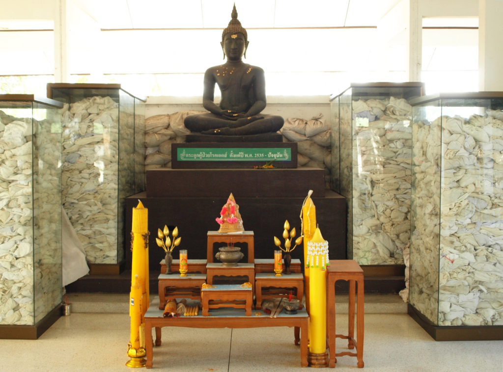 Colour photograph of an AIDS memorial inside a temple in Thailand