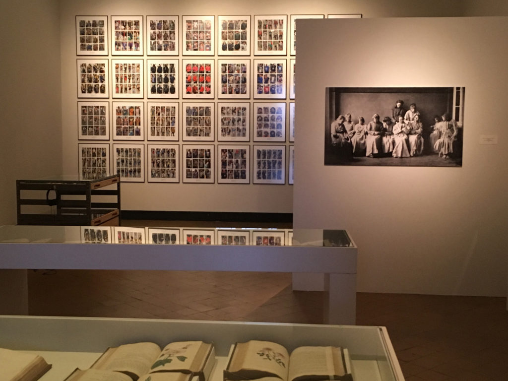 Colour photograph of a medical gallery exhibition with wall mounted photographs