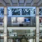 Colour photograph of a gallery view of the Medicine exhibition including the Bloom light installation