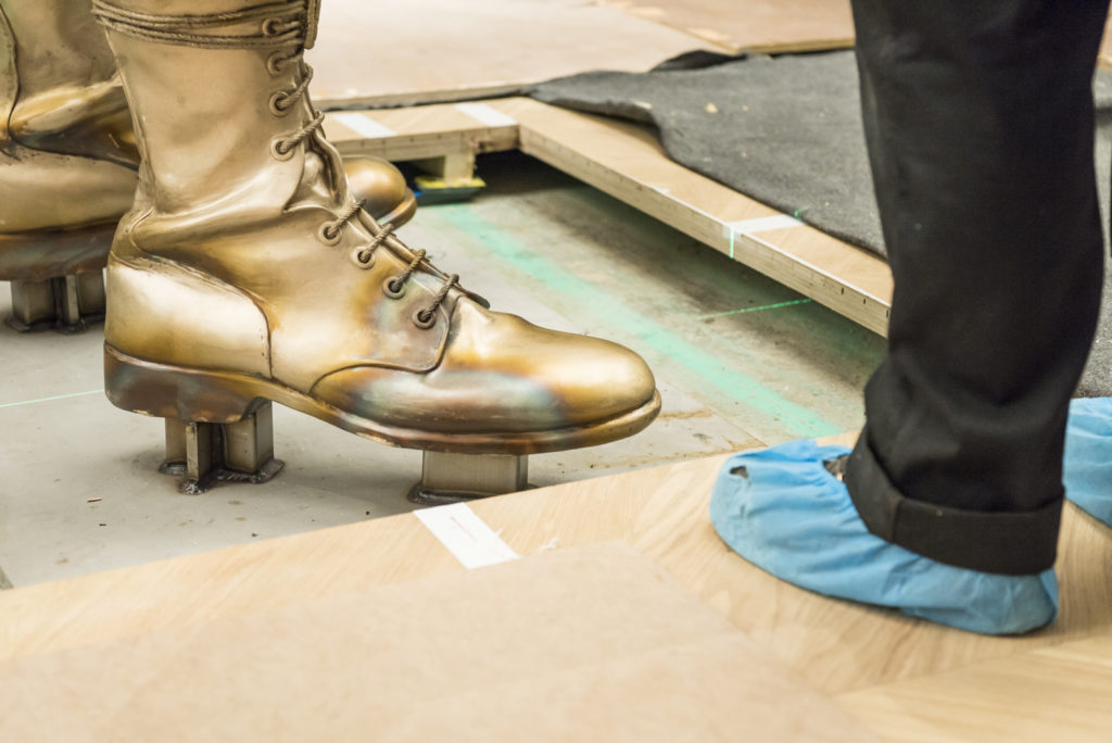 Colour photograph of the foot and floor fastening of the Self Conscious Gene sculpture