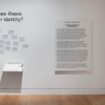 Colour photograph of a text wall at an exhibition entrance