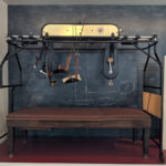 Colour photograph of a bed cycle object on display