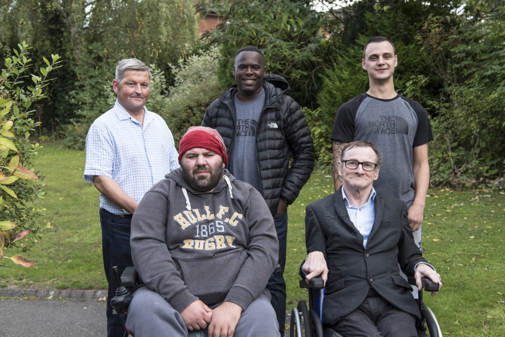 Colour photograph of members of a medical participation group
