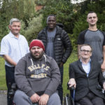 Colour photograph of members of a medical participation group