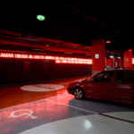 Colour photograph of an AIDS memorial using neon lighting in an underground par park