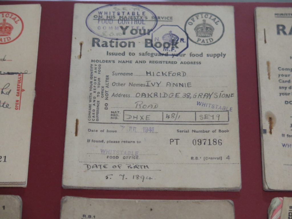 Colour photograph of World War Two ration books on display