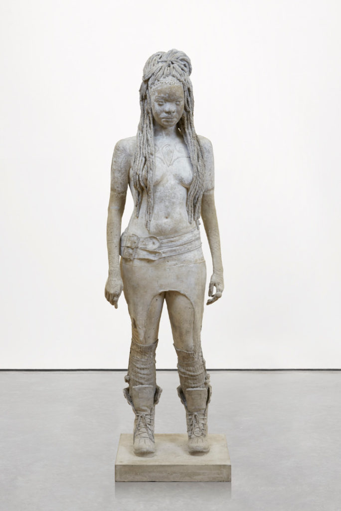 Colour photograph of a sculpture of a scarified woman entitled the Beauty of Healing
