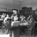 Black and white photograph showing female workers using Hollerith key punches