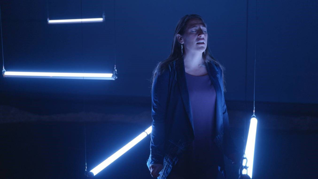 Colour photograph of a scene in the Where We Belong performance