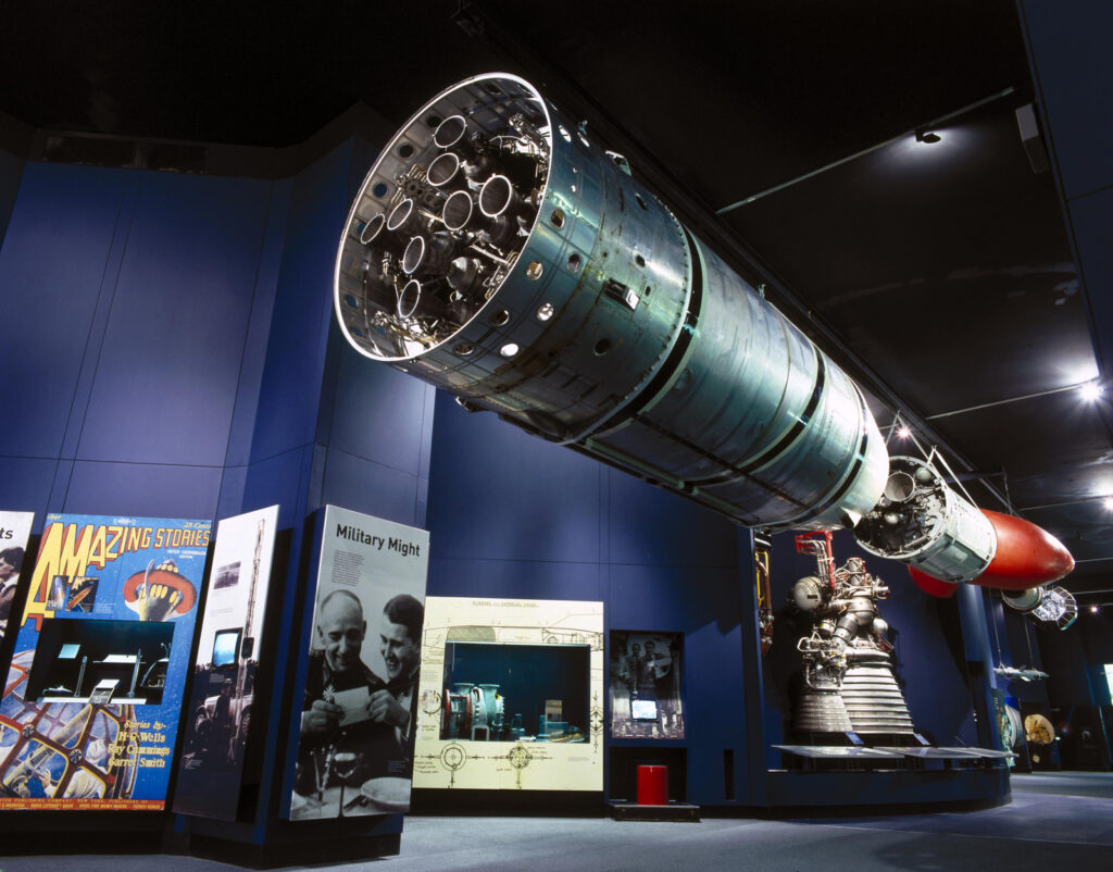 Colour photograph of the Black Arrow rocket suspended in the Science Museum Space Gallery