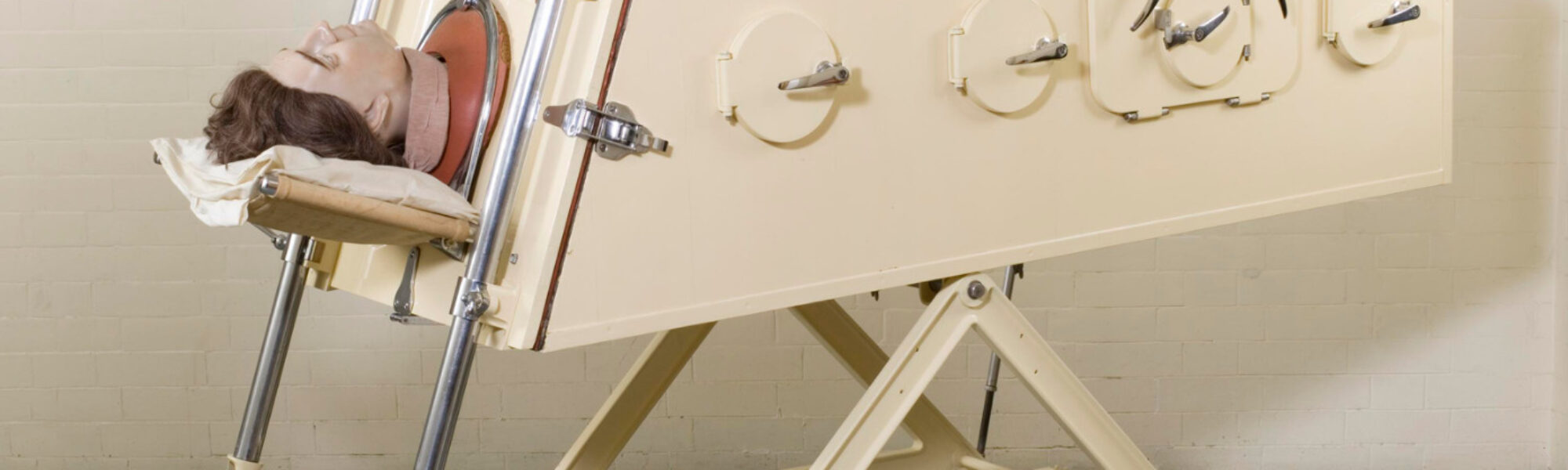 Colour photograph of an iron lung negative pressure ventilator