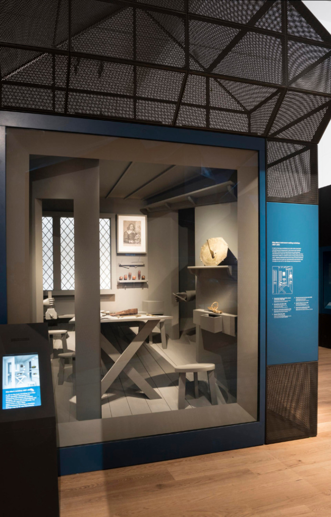 Colour photograph of a historical science workshop diorama