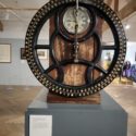 Colour photograph of a clocking in machine from the early twentieth century