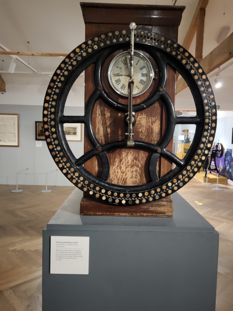 Colour photograph of a clocking in machine from the early twentieth century