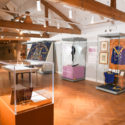Colour photograph of a view across an exhibition, located in the Leeds City Museum