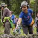 Colour photographs of participants of a sound walk in woodland